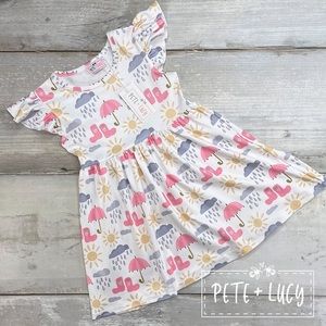 Cute sunshine or rain dress by PETE + LUCY